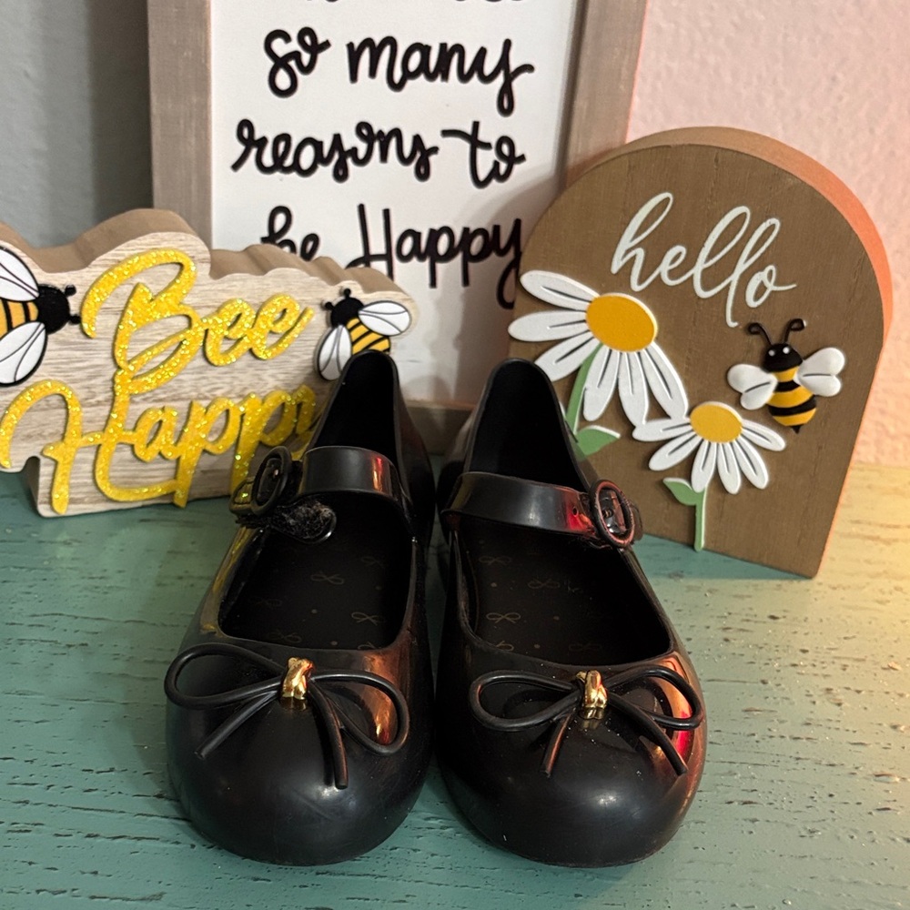 Mini Melissa Black Dress Shoes with Gold Bow
